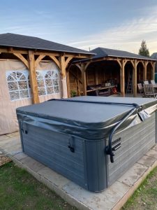 Grey Hot Tub with Cover Lifter | A6 Hot Tubs