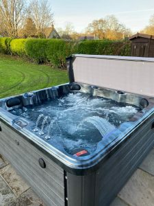 Dark Shell Hot Tub with Jets and Fountains | A6 Hot Tubs