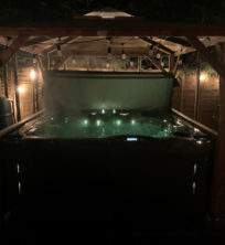 Hot Tub Install within Oak Gazebo at Night | A6 Hot Tubs